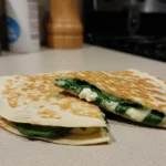 Crispy Spinach and Feta Quesadillas with fresh spinach and melted cheese