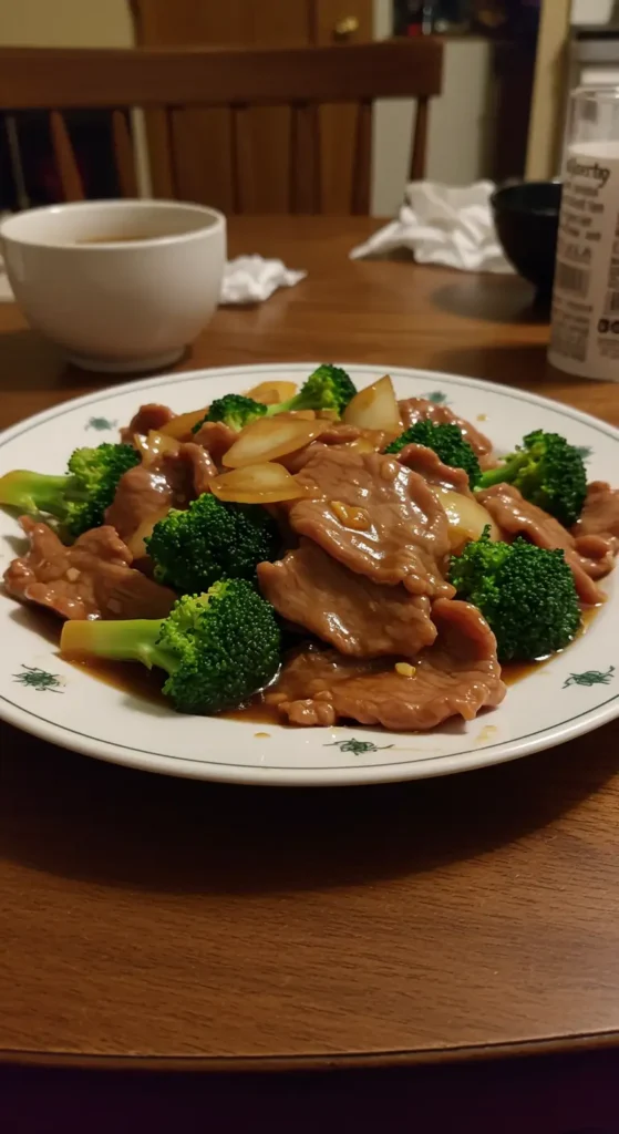 Chinese Beef and Broccoli stir fry with tender beef and crisp broccoli over rice