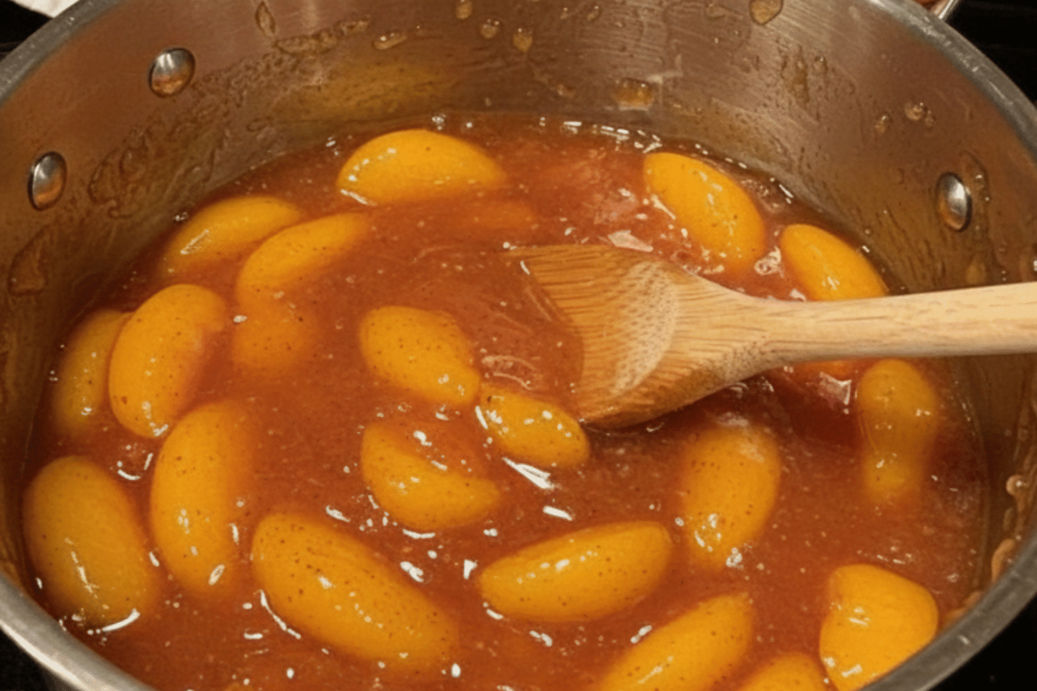 Close-up of freshly sliced ripe peaches for pie filling.